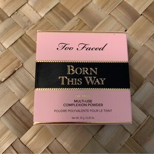 Too faced born this way multi use complexion power .